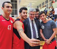 Players taking a selfie with Fadlo R. Khuri.